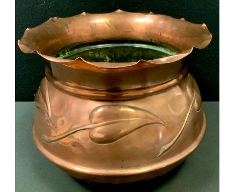 An Arts &amp; Crafts bulbous ovoid planter, shaped rim, embossed in relief with stylised tulips 