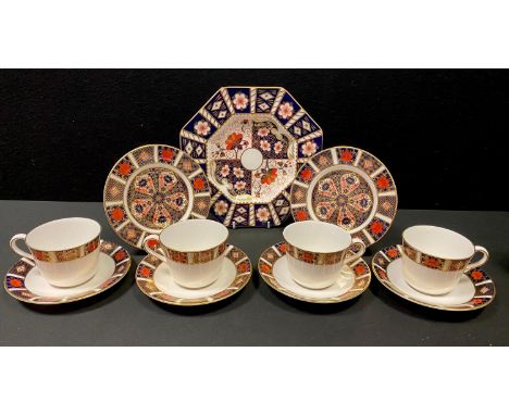 A Royal Crown Derby 2451 pattern octagonal 22.5cm plate; a pair of 1128 pattern 16cm plates, both 2nd quality; four 1314 patt