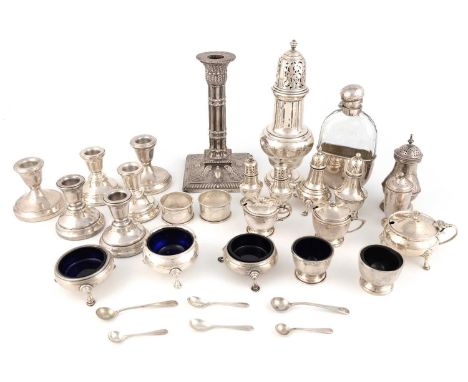A mixed lot of silver items,various dates and makers,comprising: a sugar caster, Birmingham 1906, a single candlestick, Londo