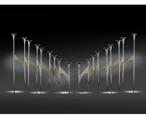 Φ By Stuart Devlin, a pair of modern parcel-gilt silver nine-light articulated candelabra, unmarked, 1983, tapering circular 