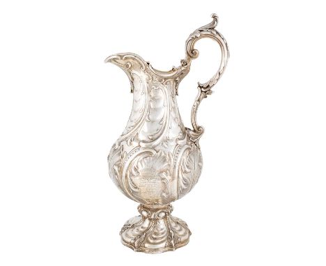 A large Victorian silver regimental ewer, by The Barnards, London 1844, baluster form, embossed scroll and rocaille decoratio