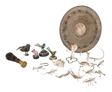 A mixed lot of South East Asian metalware items, comprising: a Sri Lankan dish, of circular form, embossed with animals and b