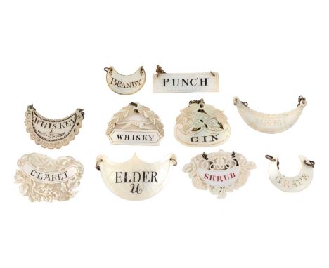 A collection of ten late-18th and early-19th century mother-of-pearl wine labels, unmarked, various designs including one wit