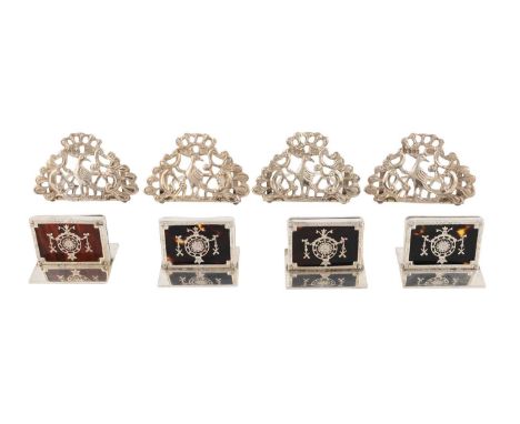 λ A set of four Victorian Scottish silver menu card holders, by Hamilton &amp; Inches, Edinburgh 1888, pierced semi-circular 