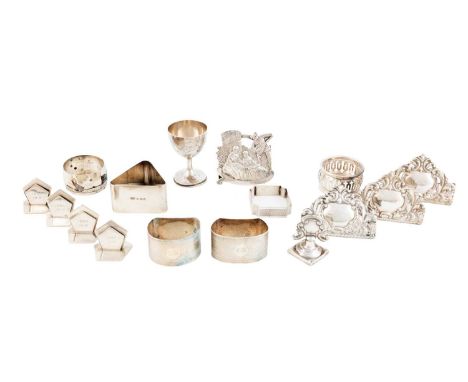 A mixed lot of small silver items, comprising: a set of four silver menu card holders by Asprey &amp; Co Ltd, London 1913, pl