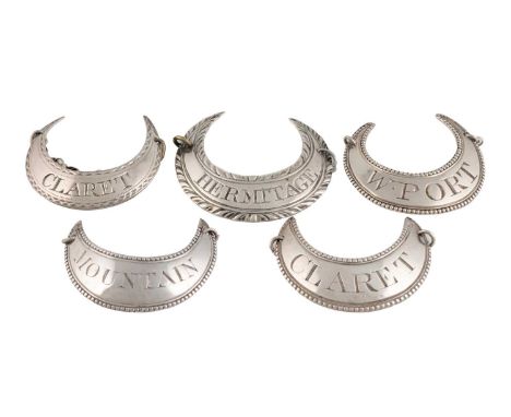 Five George III silver wine labels, by Susanna Barker, London circa 1780-90, crescent form, feather-edge, bright-cut and bead