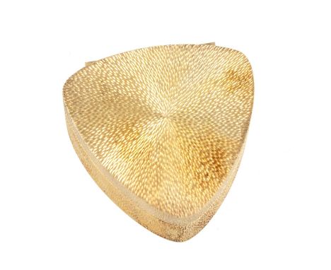By Stuart Devlin, a modern silver-gilt pill box, London 1979, rounded rectangular form, textured decoration, length 5.6cm, ap