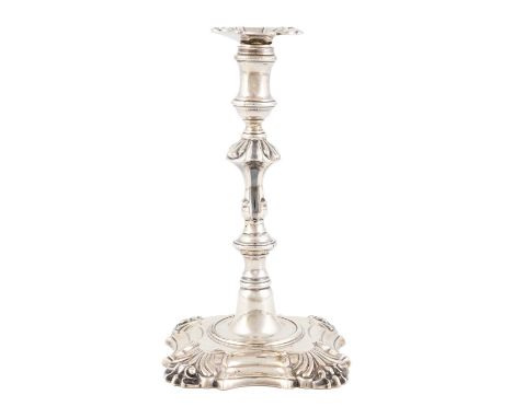 A George III silver taperstick,maker's mark of RH, London 1763,knopped baluster form, fluted shoulders, spool-shaped capital,