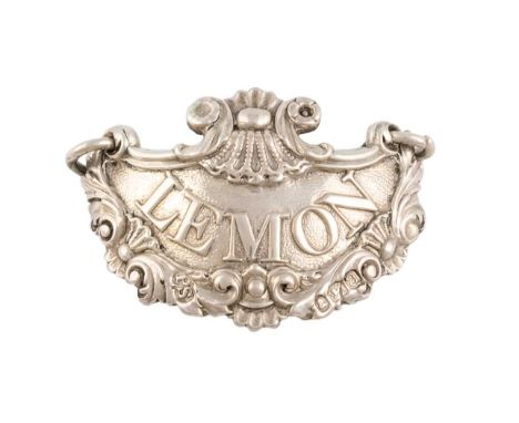 A George III silver sauce label, by Paul Storr, London 1816, oval-shaped form with a shell and scroll border, applied 'Lemon'