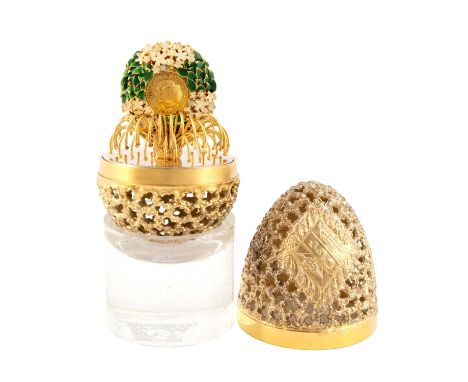 By Stuart Devlin, a modern commemorative silver-gilt prototype surprise egg, London 1981,  pierced textured body, with a Roya