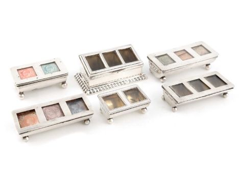 A collection of antique silver stamp boxes, comprising: one by Henry Matthews, Birmingham 1902, rectangular form with a gadro