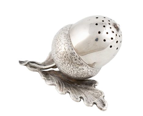 A Victorian novelty silver acorn pepper pot,by George Howson, London 1884,bayonet fitting cover, on an oak leaf base, height 