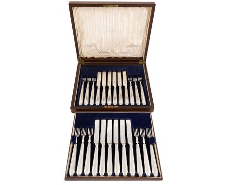 A set of twelve silver fruit knives and forks,by Harrison Brothers &amp; Howson, Sheffield 1922 and 1923,thread pattern handl