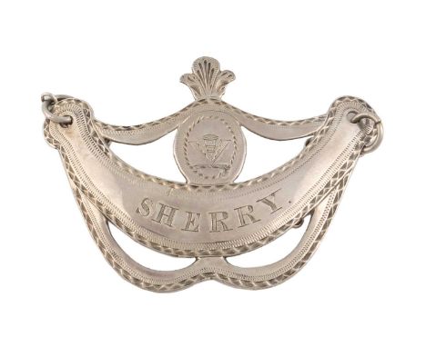 A George III Irish silver wine label, by William Law, Dublin circa 1790, banner form, with pierced and engraved decoration, w