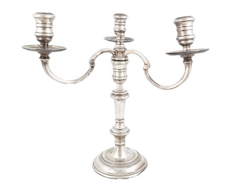 A single modern silver three-light candelabrum,by J. Campbell, London 1969,central tapering baluster column, with three scrol