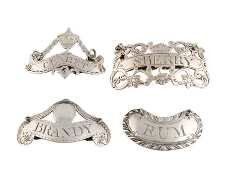 Four George III silver wine labels, by Susanna Barker, London circa 1780-92. comprising: one of banner form, with a pierced u
