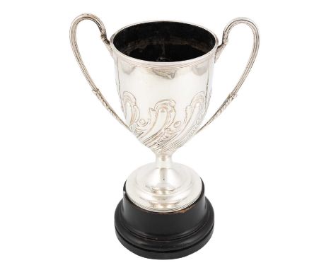 An Edwardian silver two-handled trophy cup,maker's mark possibly CS, London 1901,circular form, swirl fluted decoration, scro