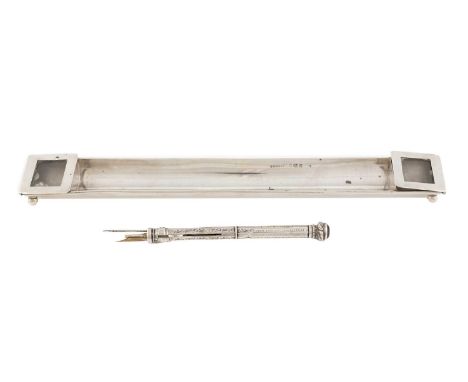 A silver pen tray and stamp case, maker's mark worn W??, Birmingham 1910,of trough form with two window stamp compartments to