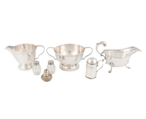 A mixed lot of silver items,various dates and makers,comprising: a cream jug and sugar bowl, Birmingham 1931, a sauce boat, a