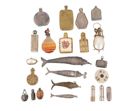 A mixed lot of silver and metalware items,comprising: four reticulated fish, two with hinged heads, plus a silver-mounted and