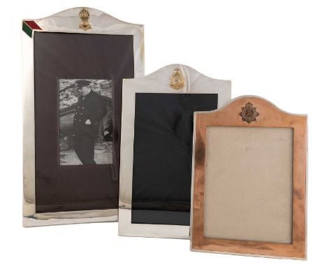 A silver-mounted copper regimental photograph frame,by Horton &amp; Allday, Birmingham 1917,shaped rectangular form, with an 