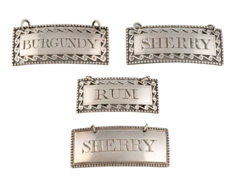 Four George III silver wine labels, by Susanna Barker, London circa 1780-90, rectangular form, three with pierced scroll and 