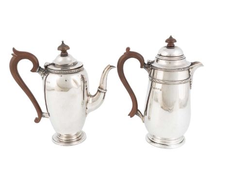 A silver coffee pot, by Asprey &amp; Co Ltd, London 1937,tapering circular form with a leaf border, height 19.7cm, plus a sil