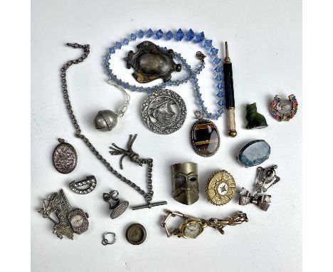 A selection of costume jewellery and miscellaneous items including a silver and marcasite timepiece brooch in the form a char