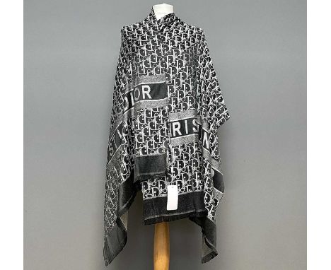 A Christian Dior D-Oblique cashmere and silk machine embroiderd scarf, with original tag, 197 x 67cm.Condition report: No vis