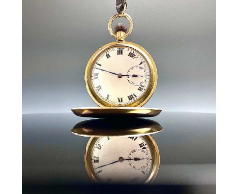 A gold plated crown wind full hunter pocket watch, the 40mm white enamel dial with Roman numerals and subsidery seconds dial,