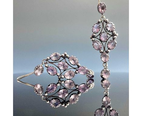 A pair of 19th century amethyst pendant drop earrings, each earring set with eight oval cut amethysts each measuring 0.75ct s