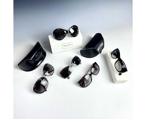 Five pairs of designer sunglasses including Jil Sanders, Etienne Aigner, Boucheron and two by Moschino.