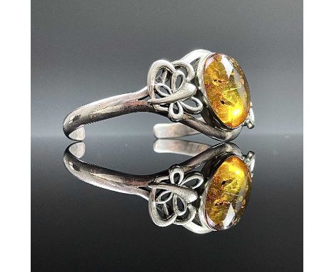 A modern 925 silver amber set bangle, weight 28.22 grams.