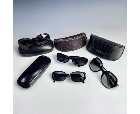 Four pairs of designer sunglasses including lanvin, Celine, Loewe and Mont Blanc.