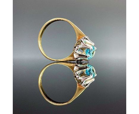 An 18ct aquamarine solitaire ring, the circular cut stone measures 0.75ct, size M, weight 3.33g.