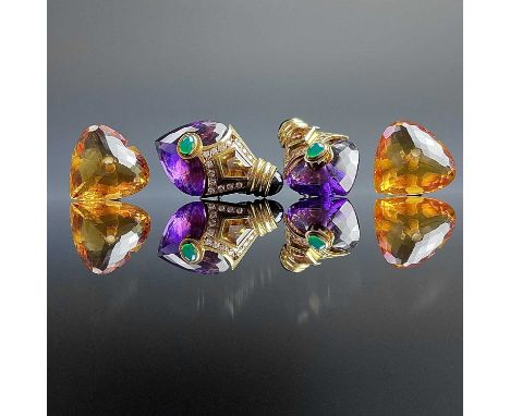 An 18ct stylish pair of 1980's gem set clip earrings, each set with a large facet cut interchangable amethyst or citrine, sma