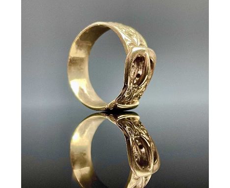 A Victorian 9ct hallmarked gold buckle ring with foliate cast decoration, Sheffield 1895, size R/S, weight 5.80 grams.