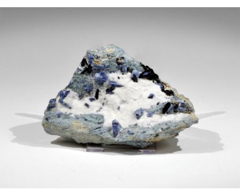  . Fine crystals of neptunite (black) and benitoite (blue) on natrolite, from the classic California, USA, locality. Cf. Bone