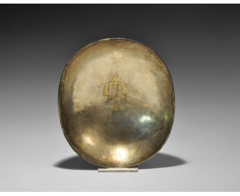  6th-7th century AD. A broad silver hemispherical bowl with rounded rim, with possibly later parcel-gilt motif to the centre 