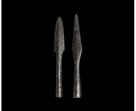  9th-12th century AD. A pair of iron light spear- or javelin-heads comprising: one with parallel-sided socket, lozenge-sectio