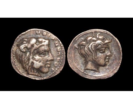  425-405 BC. Obv: LONGANAION retrograde legend, head of youthful Herakles right, wearing lionskin headdress. Rev: horned head