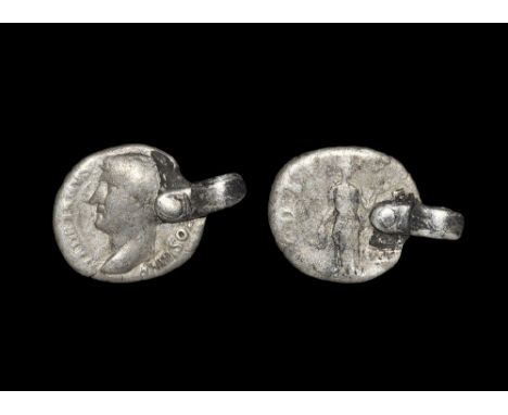  6th century AD. A silver pendant made from a denarius of emperor Hadrian mounted with a flat-section loop rivetted to both f
