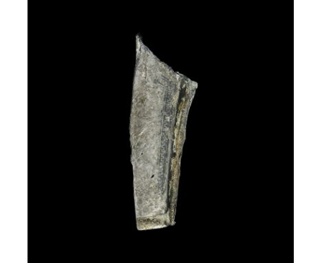  9th-11th century AD. A silver sheath with lower edge fluted to accommodate the horn’s mouthpiece; the main panel bearing a s