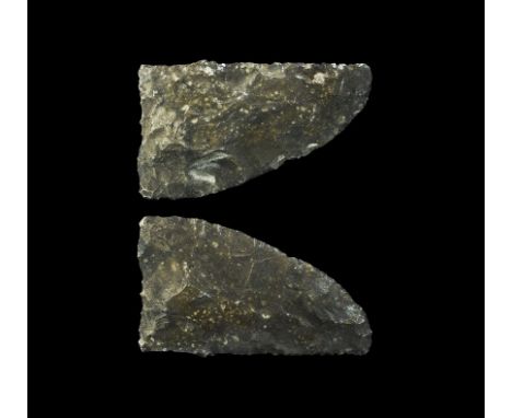  Neolithic, 4th-2nd millennium BC. A bifacial knife in dark grey-brown flint, the cutting edge straight and with convex back;