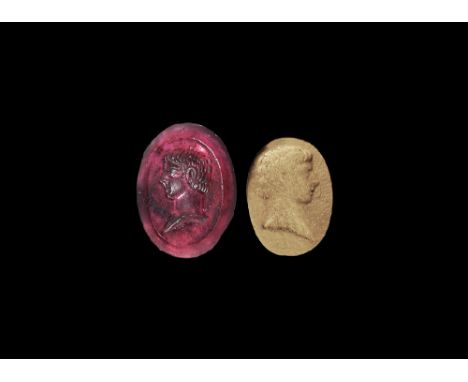  1st century AD. A discoid garnet plaque with chamfered edge, intaglio profile portrait bust of Germanicus Julius Caesar. 0.4