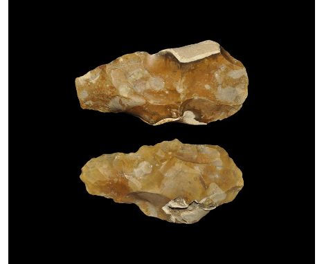  Palaeolithic, circa 350000 BP. A group of bifacial flint handaxes of tapering form, with typical orange-brown river terrace 