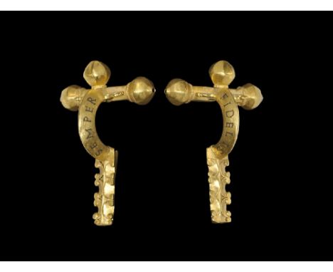  4th-5th century AD. A hollow fabricated gold crossbow brooch with hexagonal-section arms, two onion-shaped knops to the arms