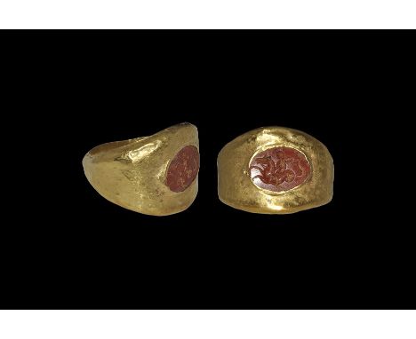  1st century AD. A red jasper cloison with intaglio motif of winged Eros riding a hippocampus, set in a later hollow-formed D