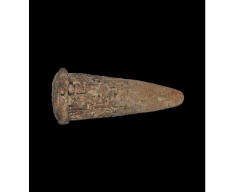  2144 - 2124 BC. A terracotta temple cone with domed upper surface, vertical bands of cuneiform text to the sides; attributed