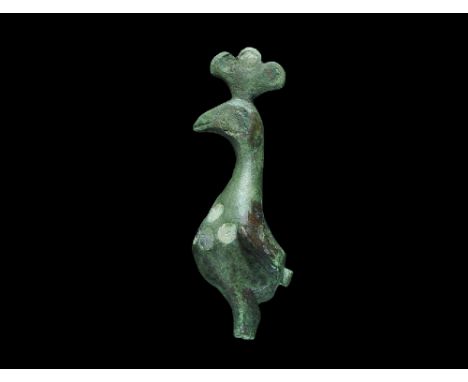  1st-2nd century AD. A bronze Romano-British peacock figurine with trefoil comb, piriform body, stub legs, flat rump with stu